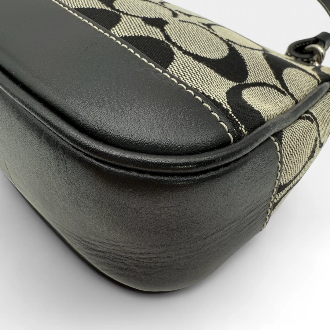 Coach Pochette black leather details monogram beige