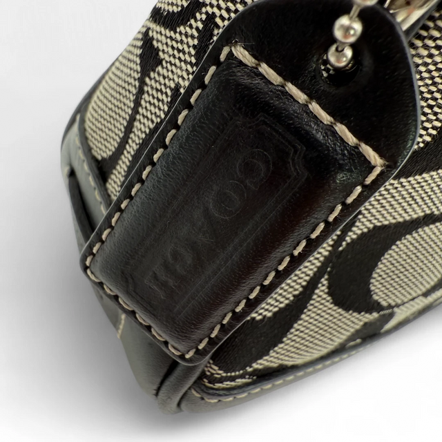 Coach Pochette black leather details monogram beige