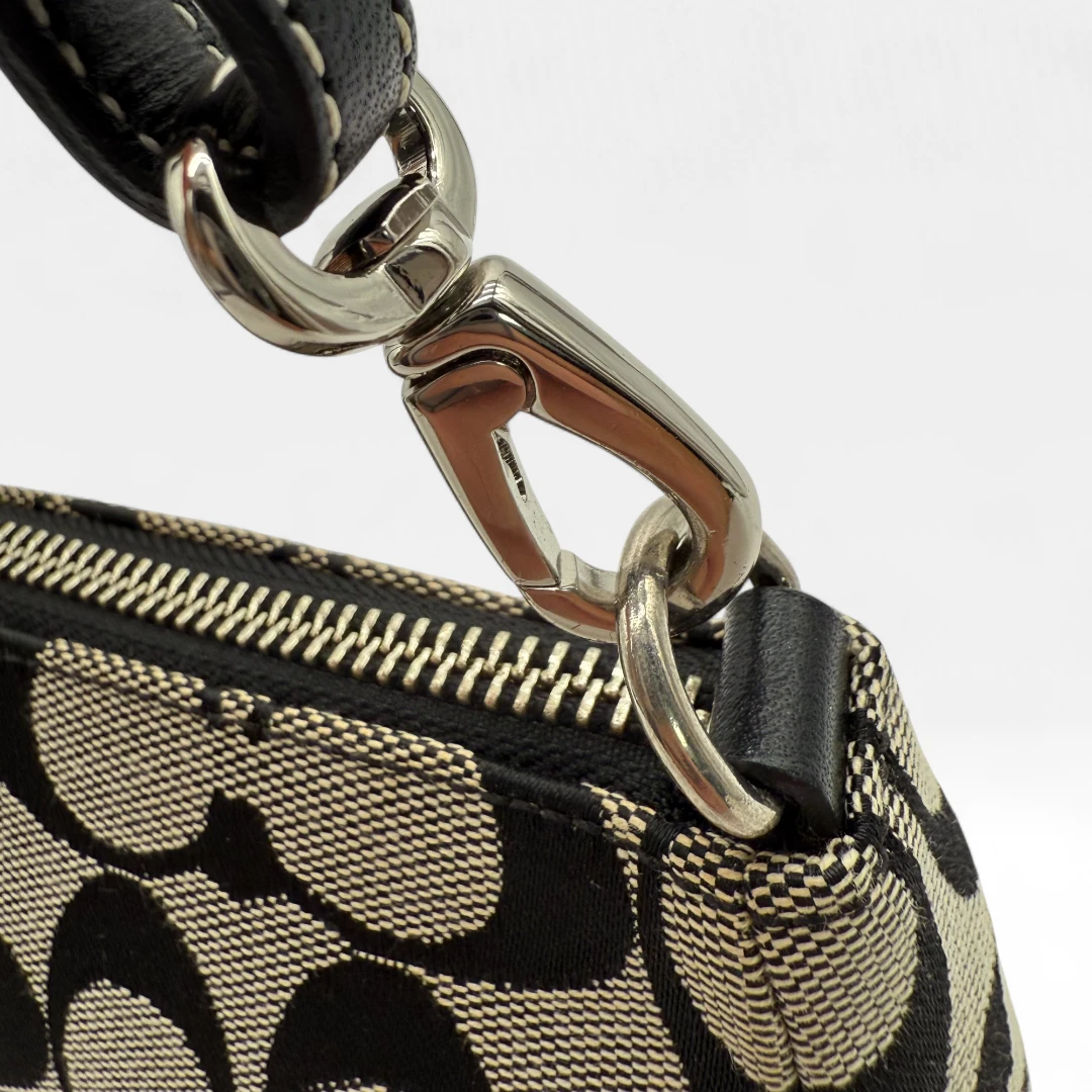 Coach Pochette black leather details monogram beige