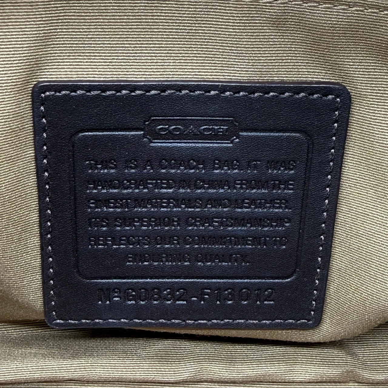 Coach Schultertasche Soho Signature beige