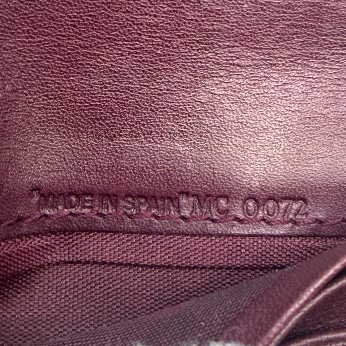 Dior Geldbeutel Oblique Saddle weinrot – Seriennummer im Detail