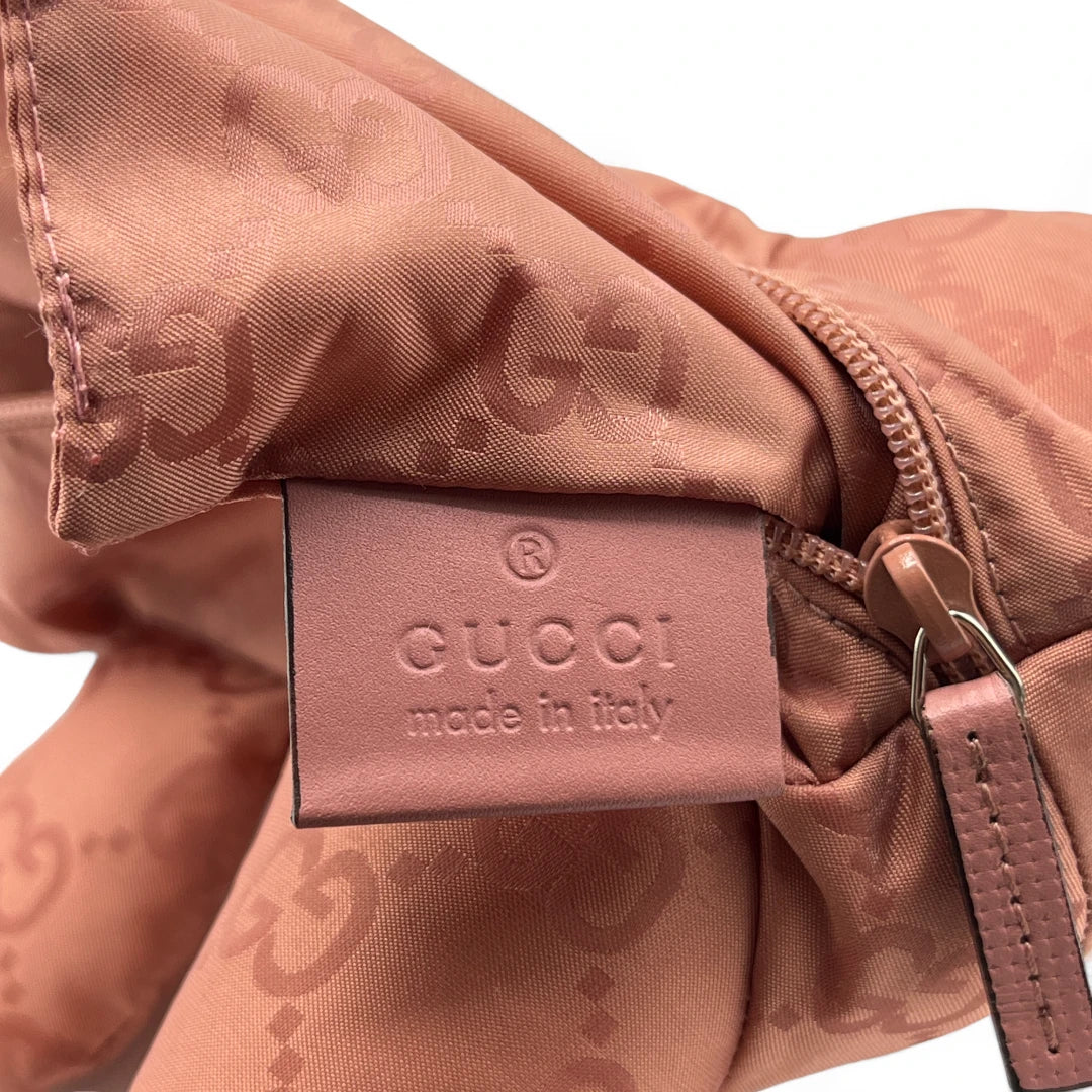 Gucci wallet made of orange monogram leather