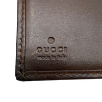 Gucci Geldbeutel Bifold monogram beige – Prägung im Detail