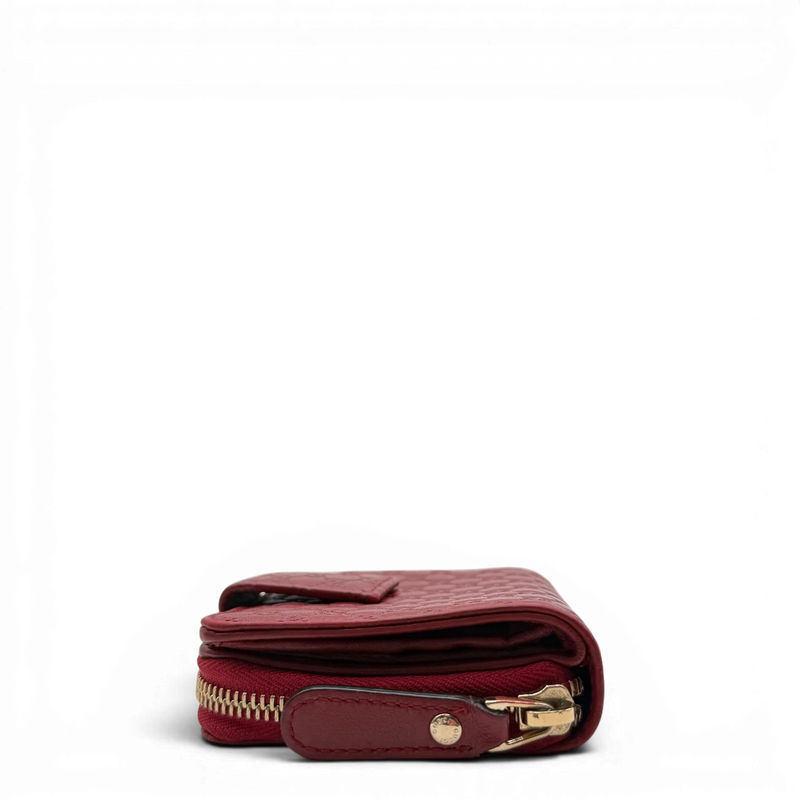 Gucci Geldbeutel Compact Micro Guccissima