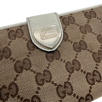 Gucci Geldbeutel Heart länglich monogram beige – Logo im Detail