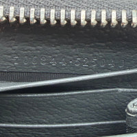 Gucci Geldbeutel Supreme Zip monogram grau – Seriennummer im Detail