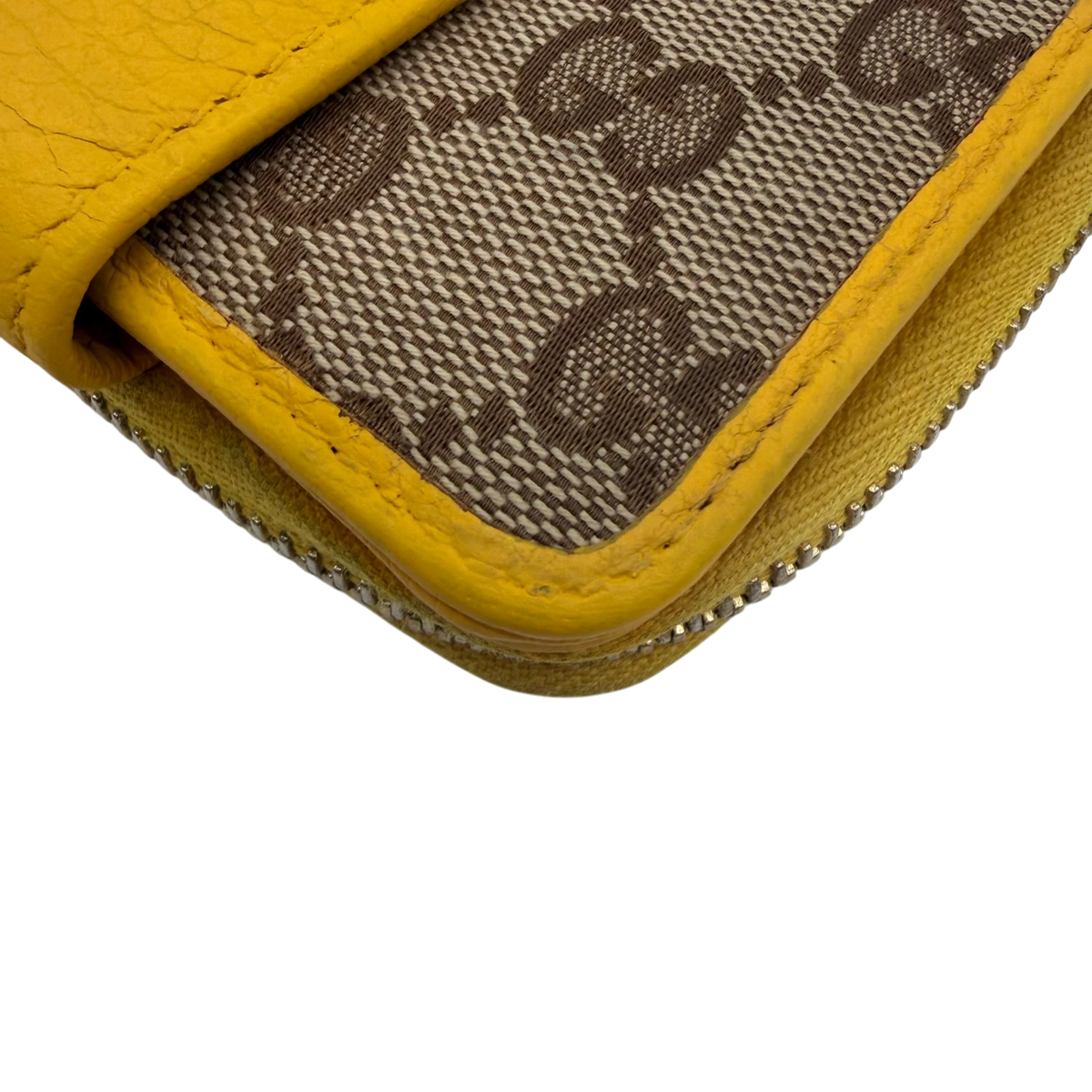 Gucci Geldbeutel Zipper small monogram beige – Ecken im Detail