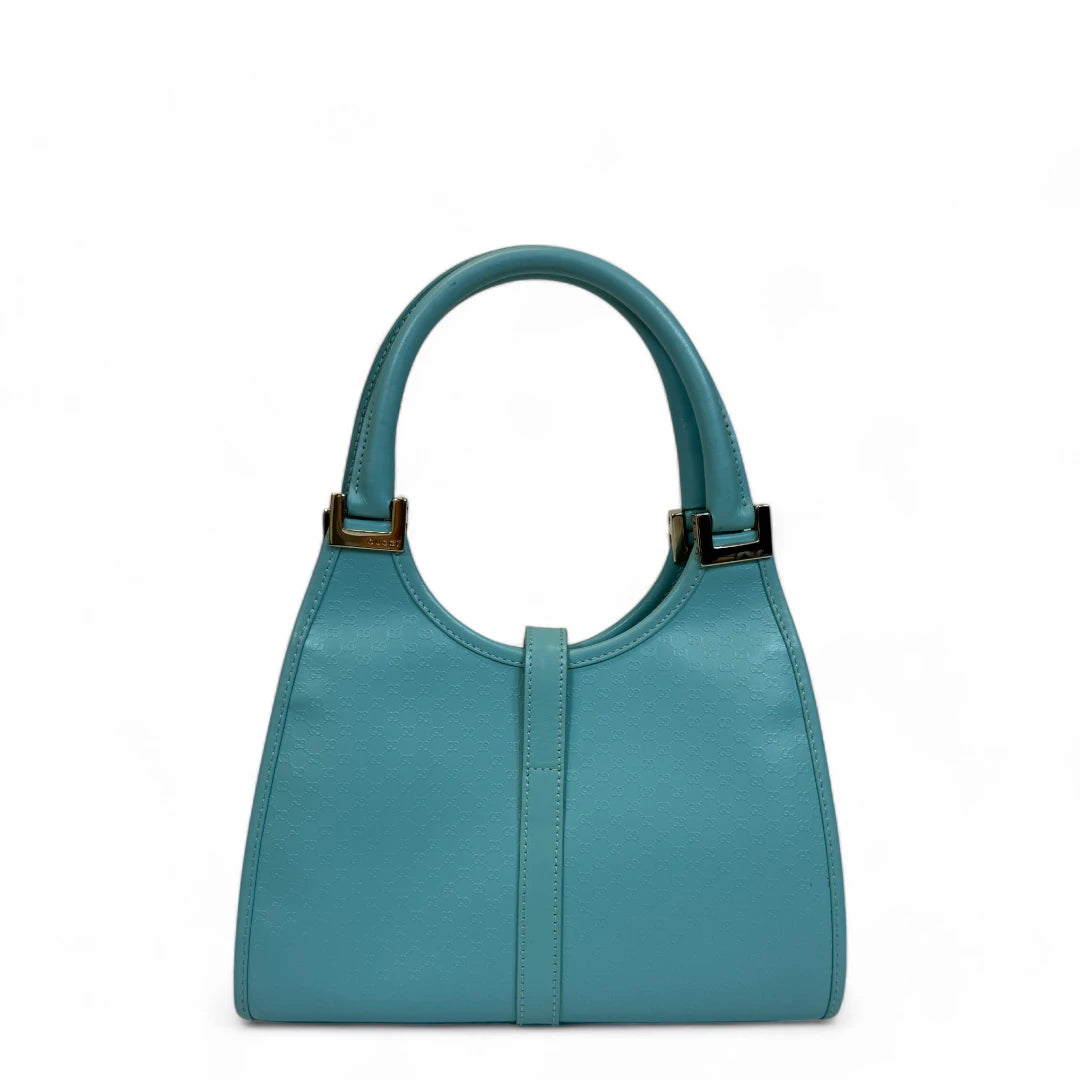 Gucci Handtasche Jackie Micro Guccissima aus Leder monogram türkis