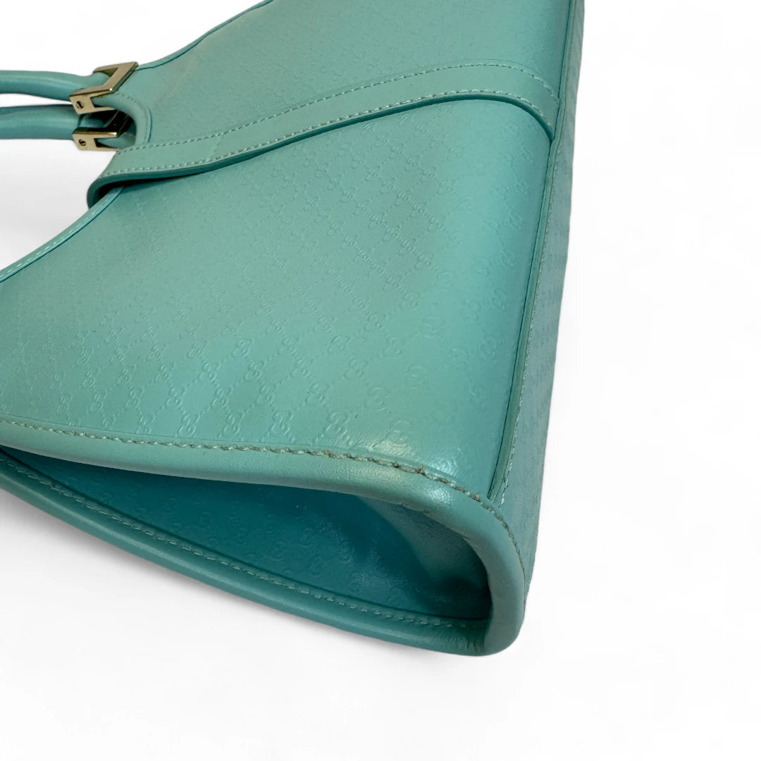 Gucci Handtasche Jackie Micro Guccissima aus Leder monogram türkis