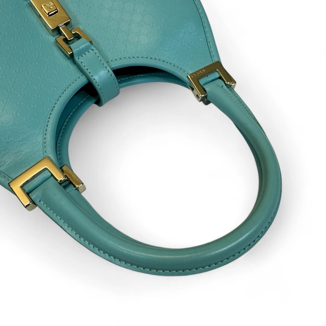 Gucci Handtasche Jackie Micro Guccissima aus Leder monogram türkis