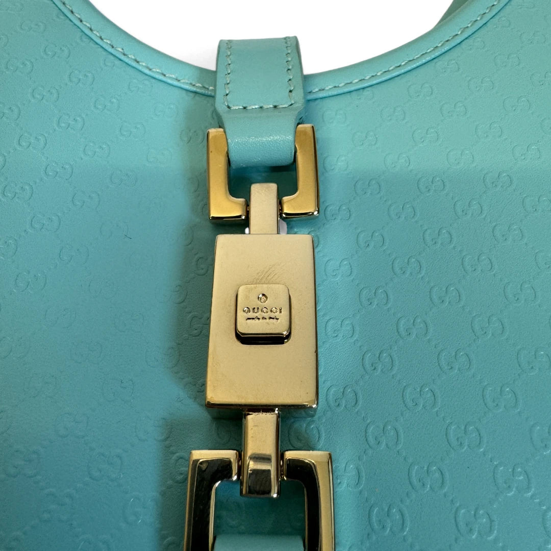 Gucci Handtasche Jackie Micro Guccissima aus Leder monogram türkis