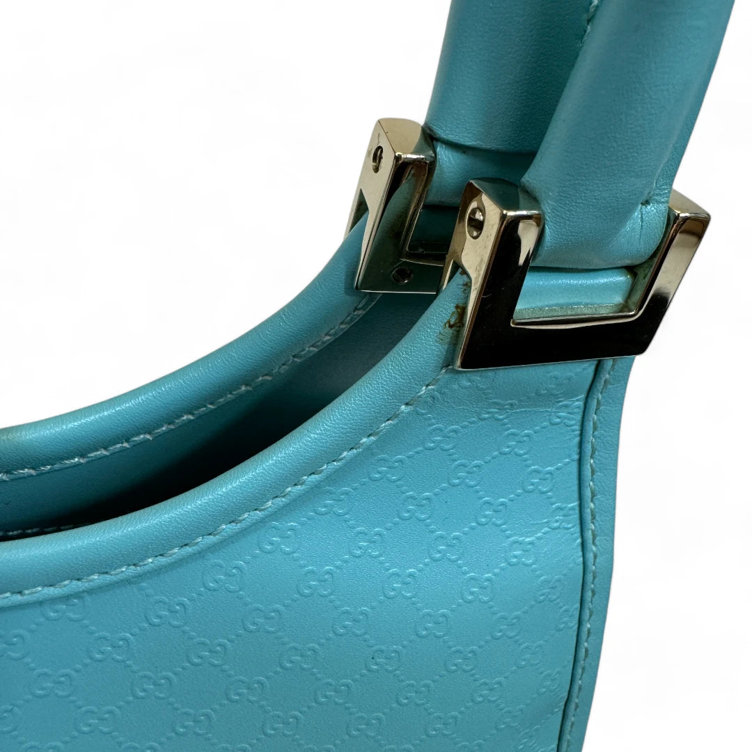 Gucci Handtasche Jackie Micro Guccissima aus Leder monogram türkis