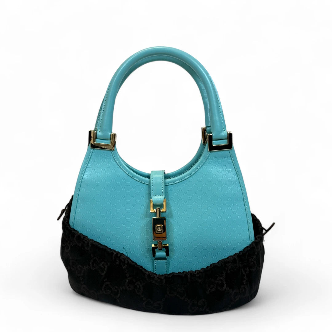 Gucci Handtasche Jackie Micro Guccissima aus Leder monogram türkis