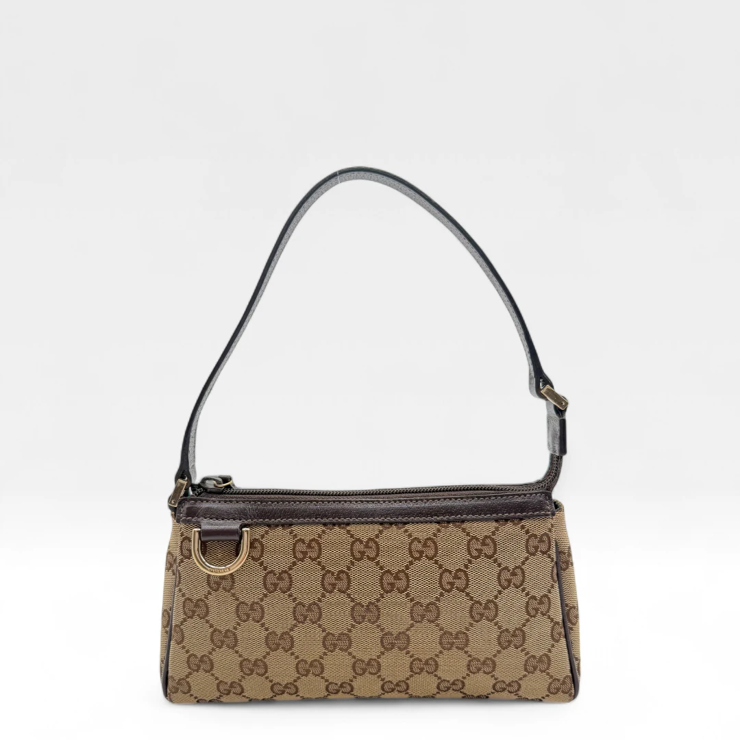 Gucci Pochette mit braunen Lederdetails monogram braun