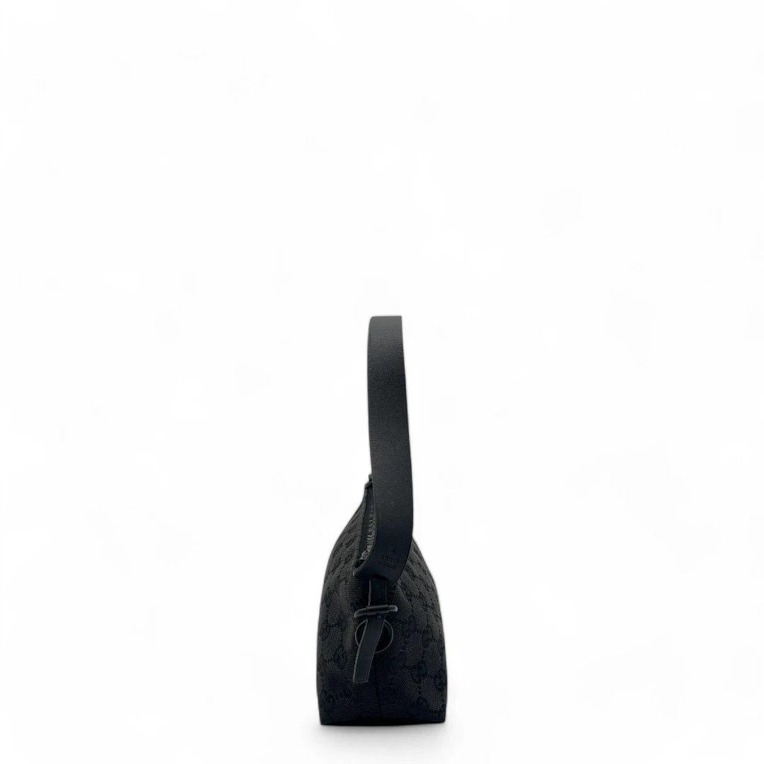 Gucci handbag / pochette with black leather details monogram black