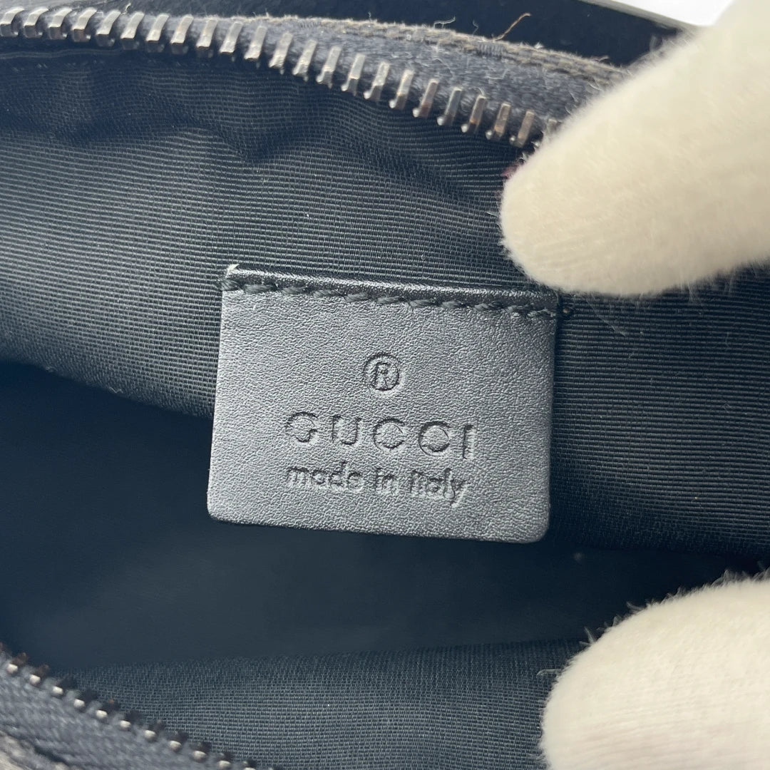 Gucci handbag / pochette with black leather details monogram black