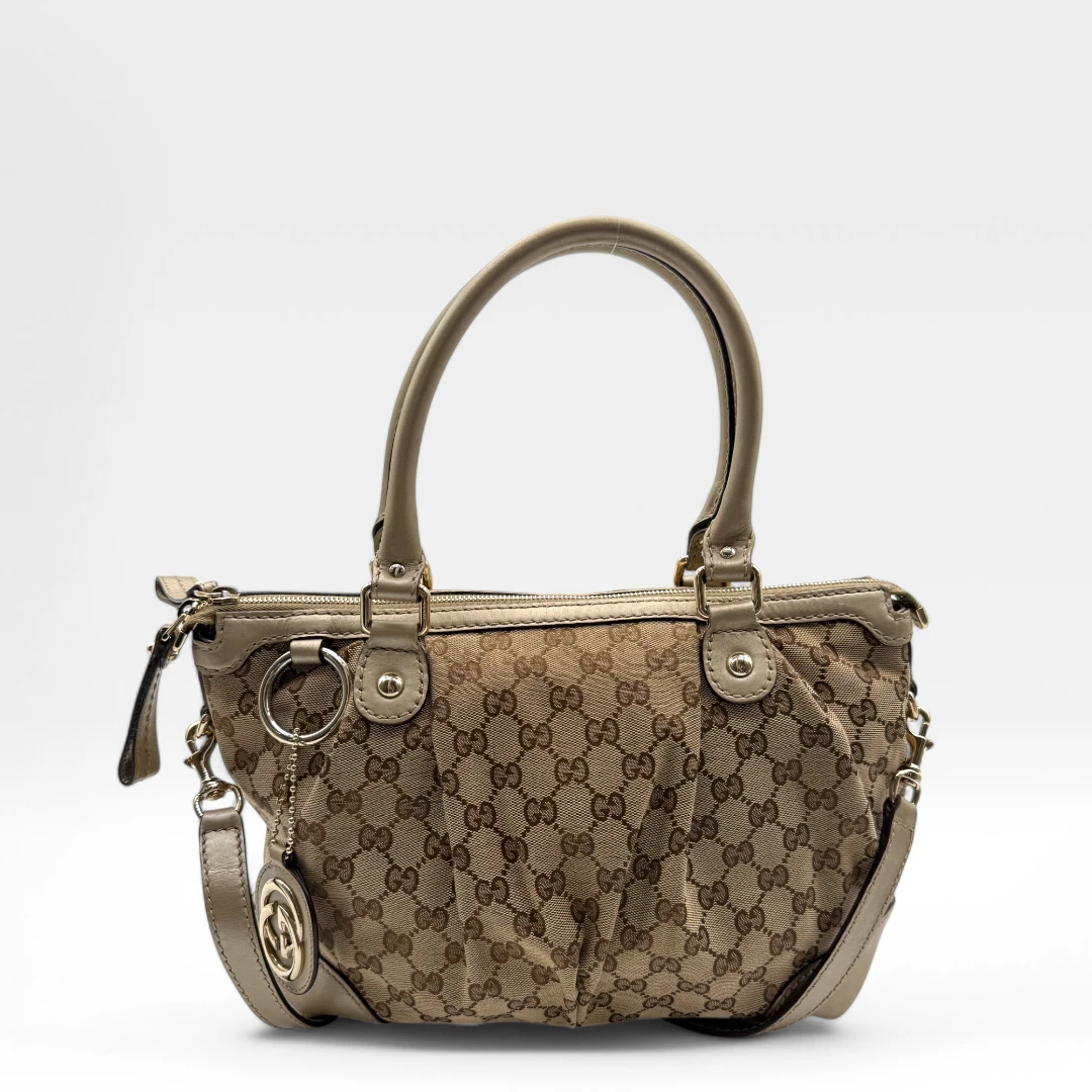 Gucci Handtasche Sukey goldene Lederdetails beige