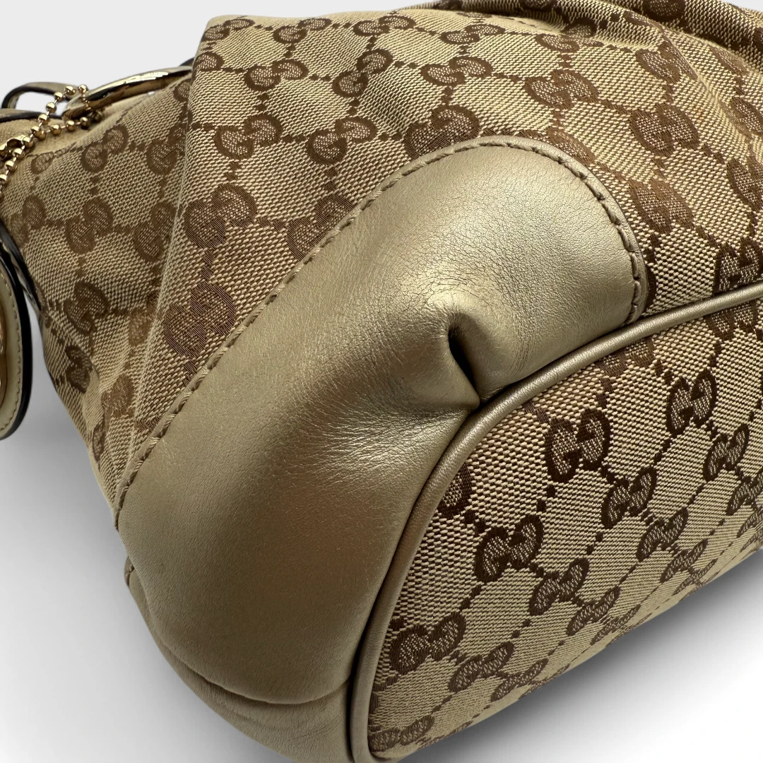 Gucci Handtasche Sukey goldene Lederdetails beige