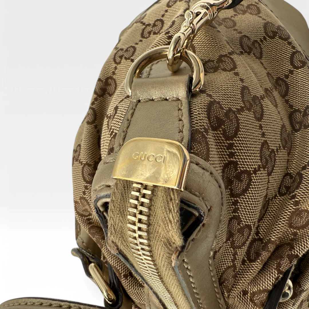 Gucci Handtasche Sukey goldene Lederdetails beige