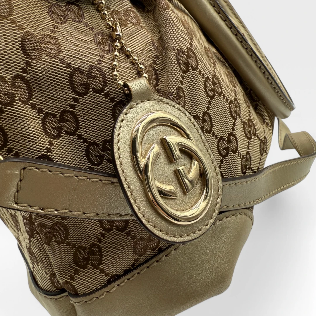 Gucci Handtasche Sukey goldene Lederdetails beige