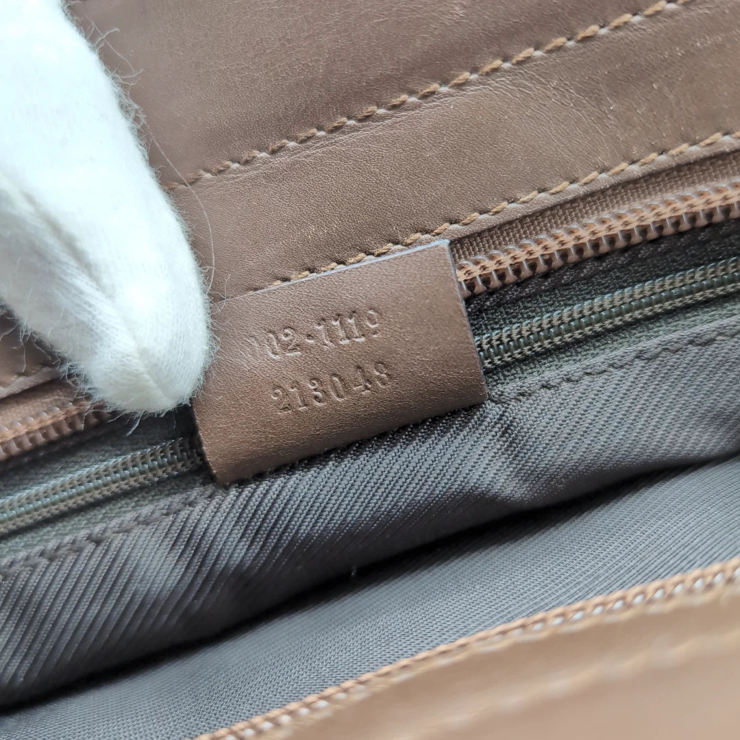 Gucci handbag dark brown leather details monogram beige 