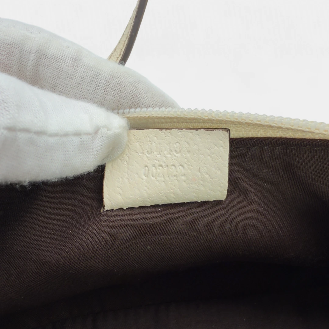 Gucci Pochette mit Charms