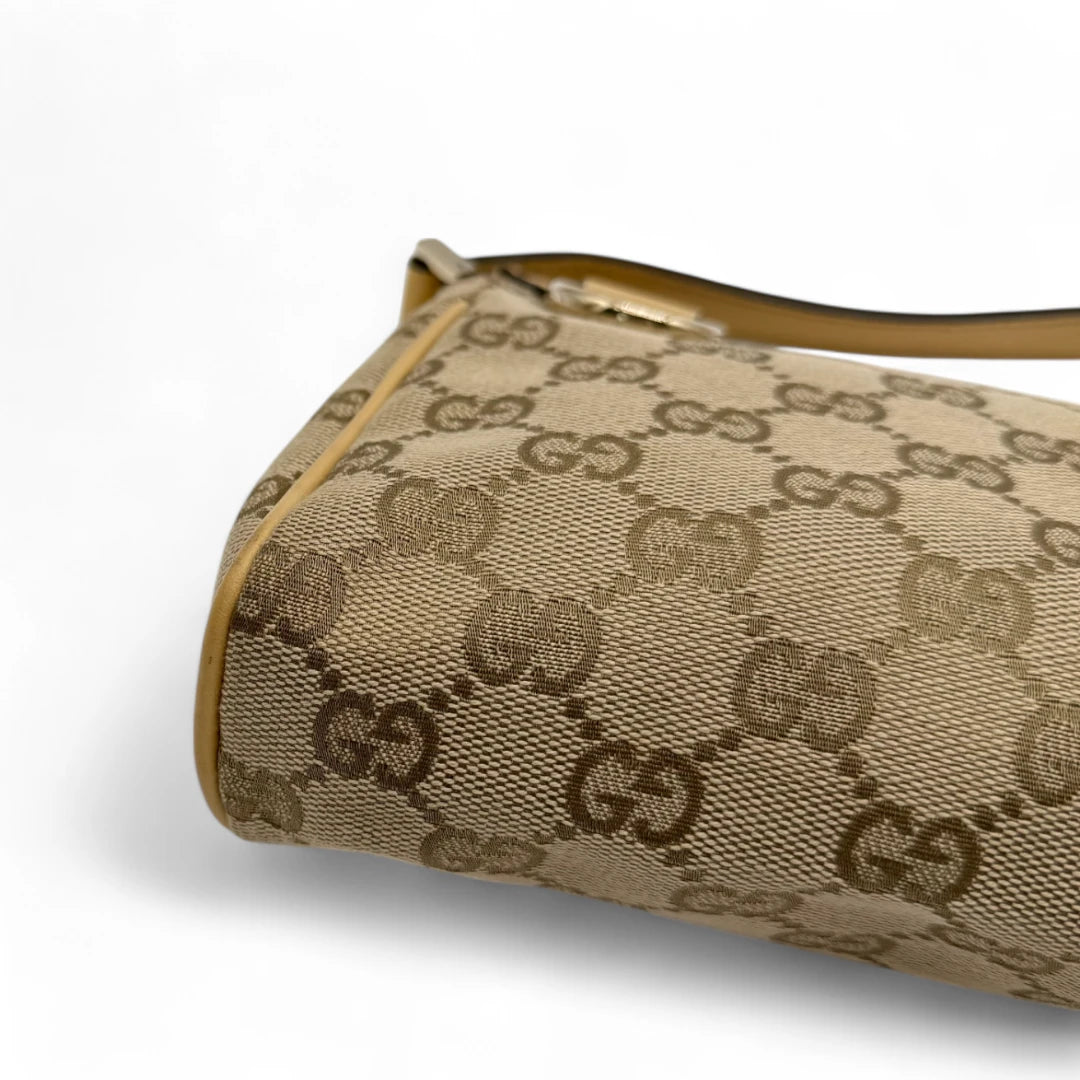 Gucci Pochette with light brown leather details monogram beige
