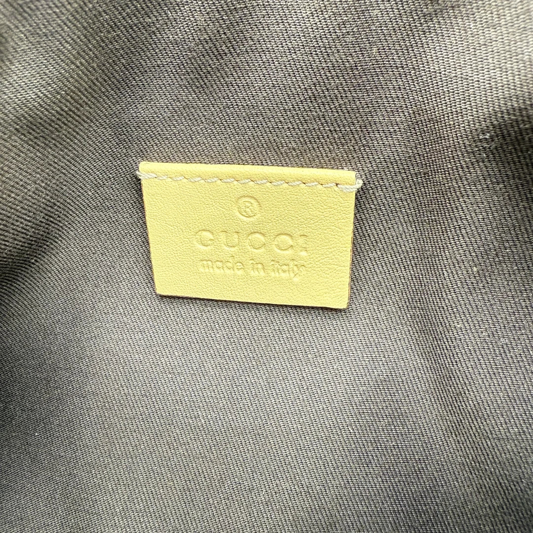 Gucci Pochette with light brown leather details monogram beige