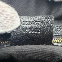Gucci Schultertasche Charmy Boston monogram schwarz – Seriennummer im Detail