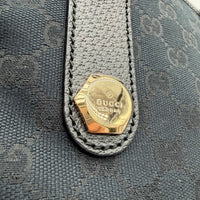 Gucci Schultertasche Charmy Mini Shopper monogram schwarz – Prägung im Detail