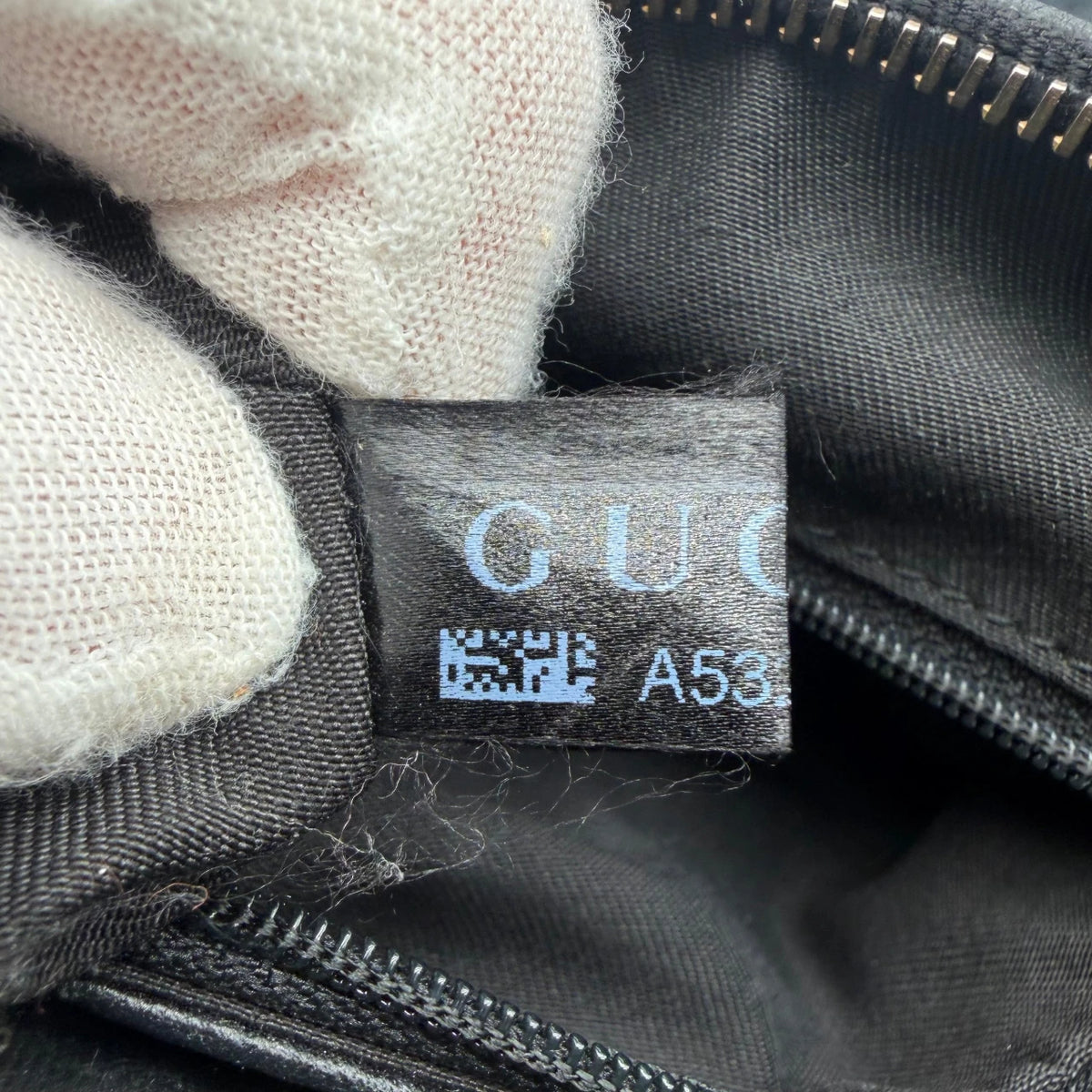 Gucci Schultertasche D-Ring large monogram schwarz – Seriennummer im Detail
