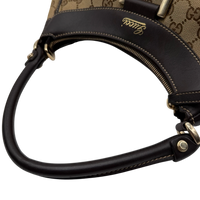 Gucci Schultertasche D-Ring monogram beige – Prägung im Detail
