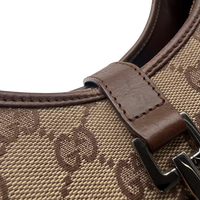 Gucci Schultertasche Jackie monogram beige – Henkel im Detail