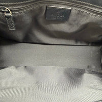 Gucci Schultertasche Jackie small monogram schwarz – Innenetikett im Detail