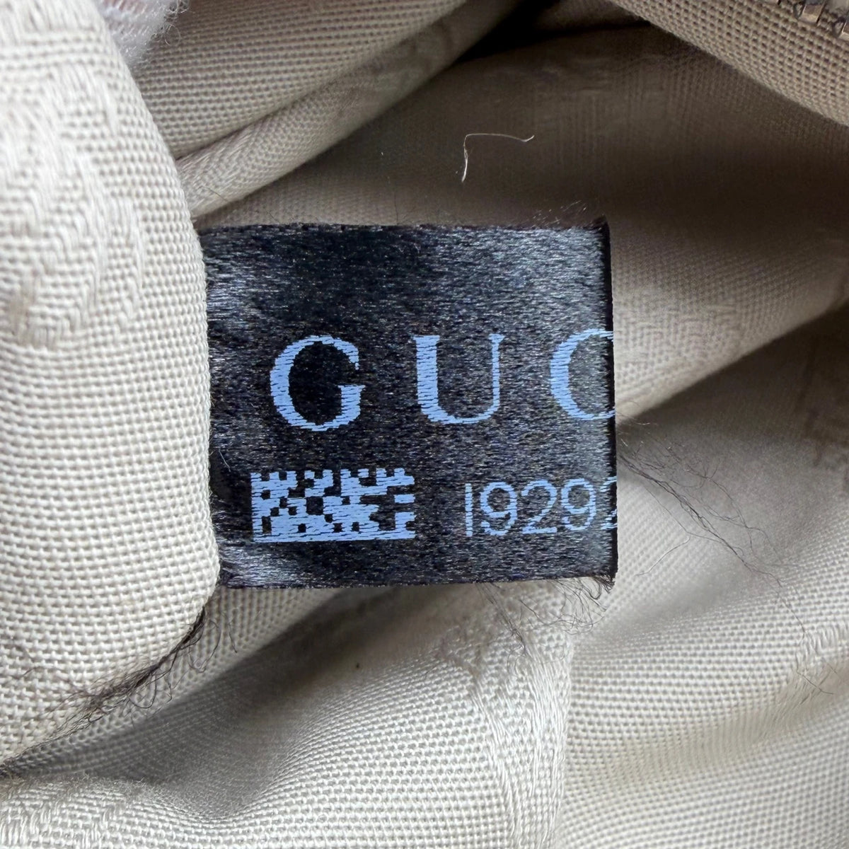 Gucci Schultertasche Marrakech Hobo monogram beige – Seriennummer im Detail