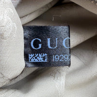 Gucci Schultertasche Marrakech Hobo monogram beige – Seriennummer im Detail