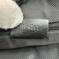 Gucci Schultertasche monogram schwarz – Seriennummer im Detail