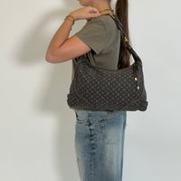 Louis Vuitton Schultertasche Mini Lin Manon MM Hobo