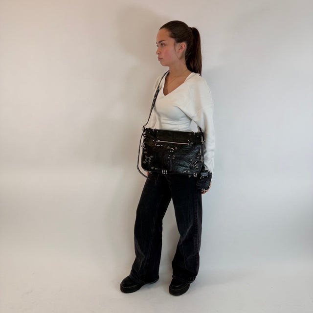 Messengertasche Le Cagole mit Piercings