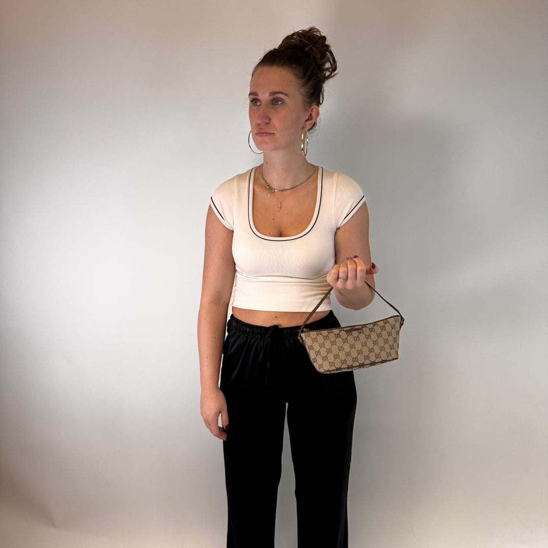Gucci Baguette monogram beige handbag