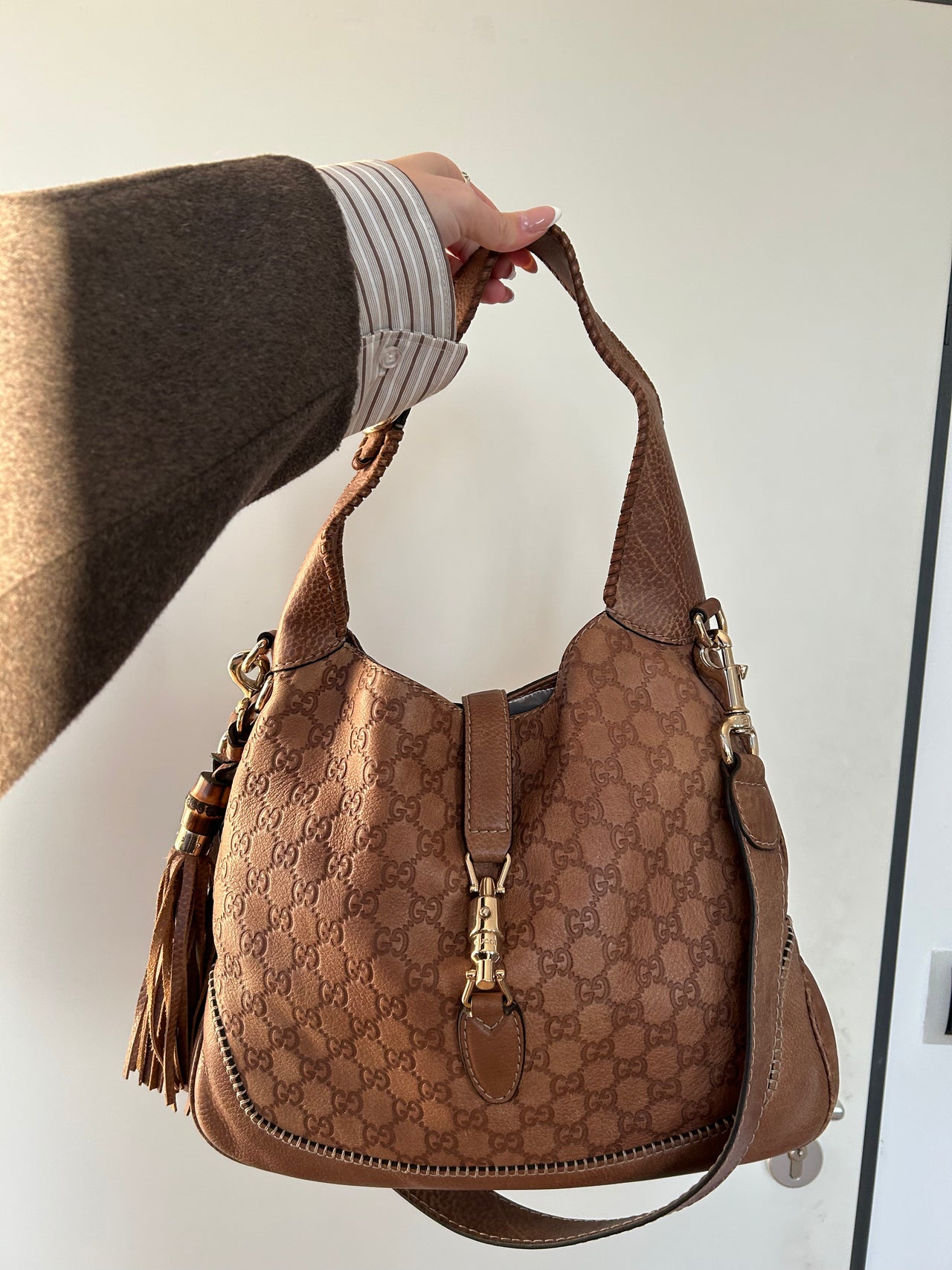 Gucci Handtasche Jackie aus Leder monogram braun