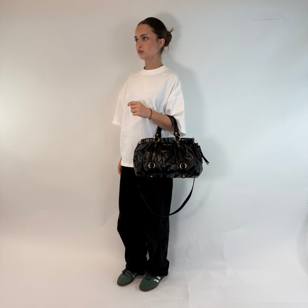 Miu Miu handbag Vitello Lux with shoulder strap made of black leather