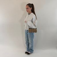 Coach Pochette Signature beige