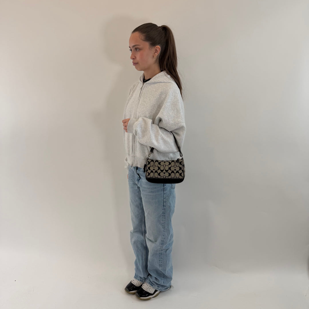 Coach Pochette Signature