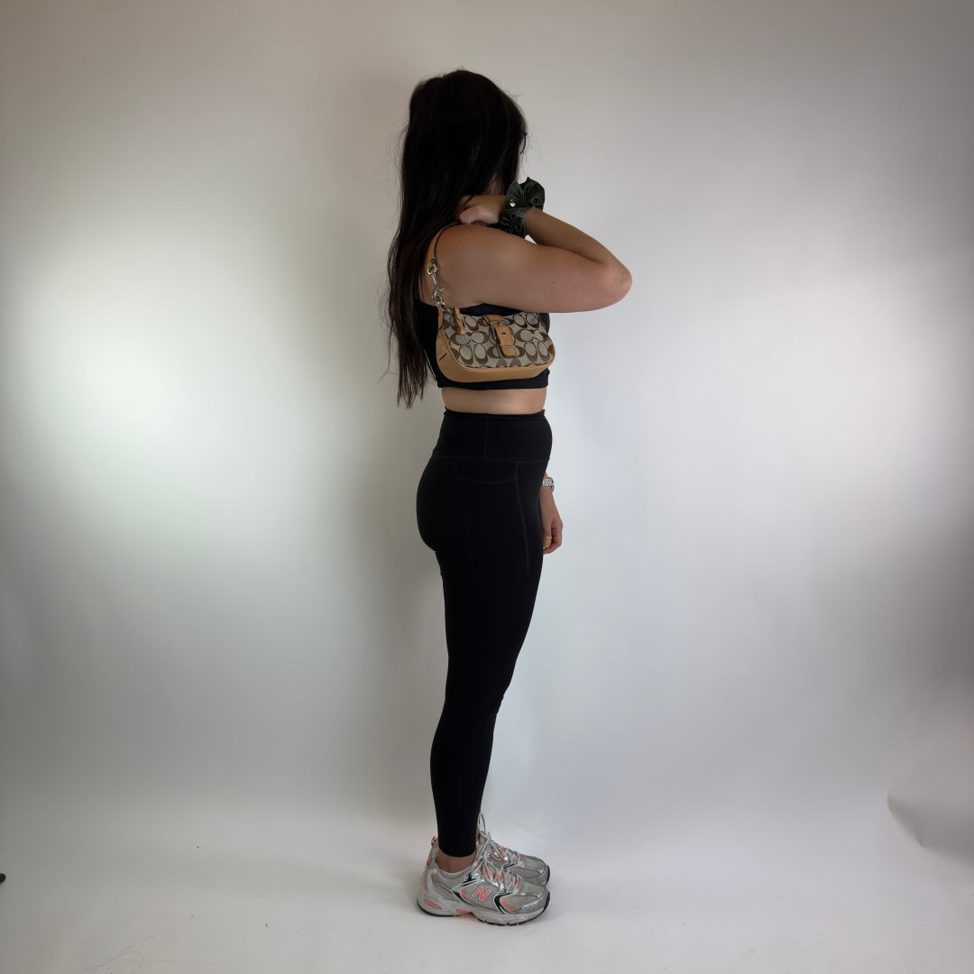 Coach Pochette Soho Signature