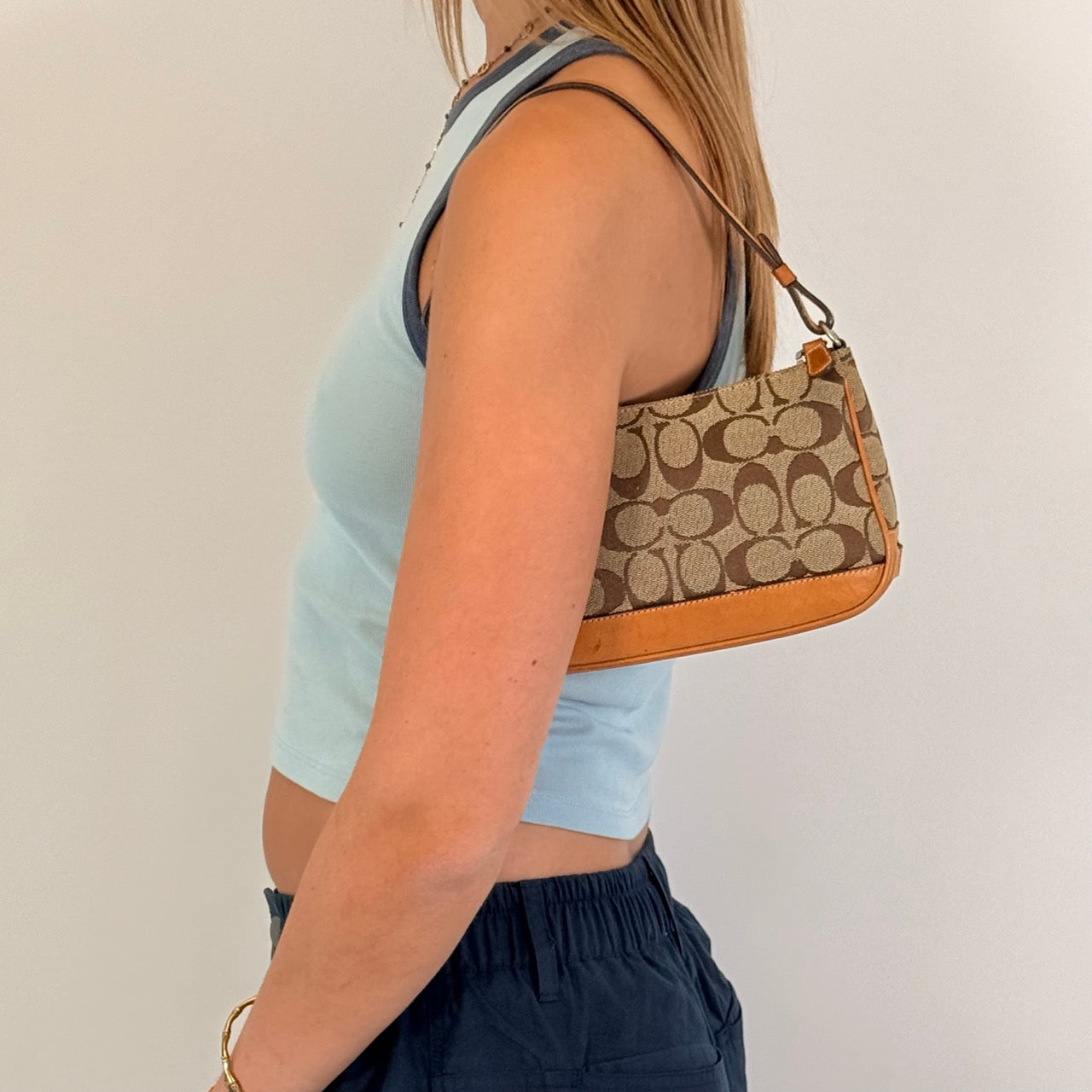Coach Pochette Signature