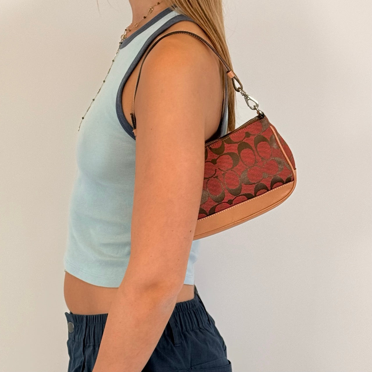Coach Pochette Signature