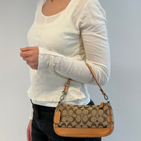 Coach Pochette Signature