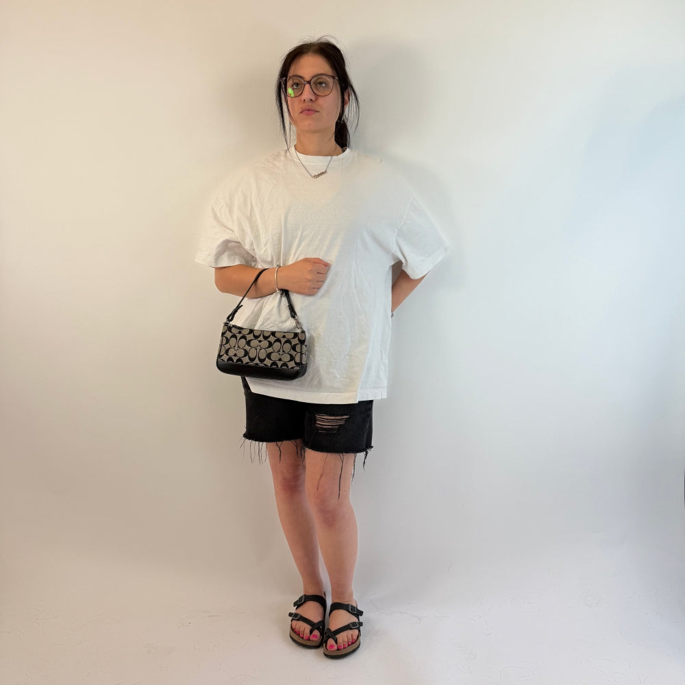 Coach Pochette schwarze Lederdetails monogram beige