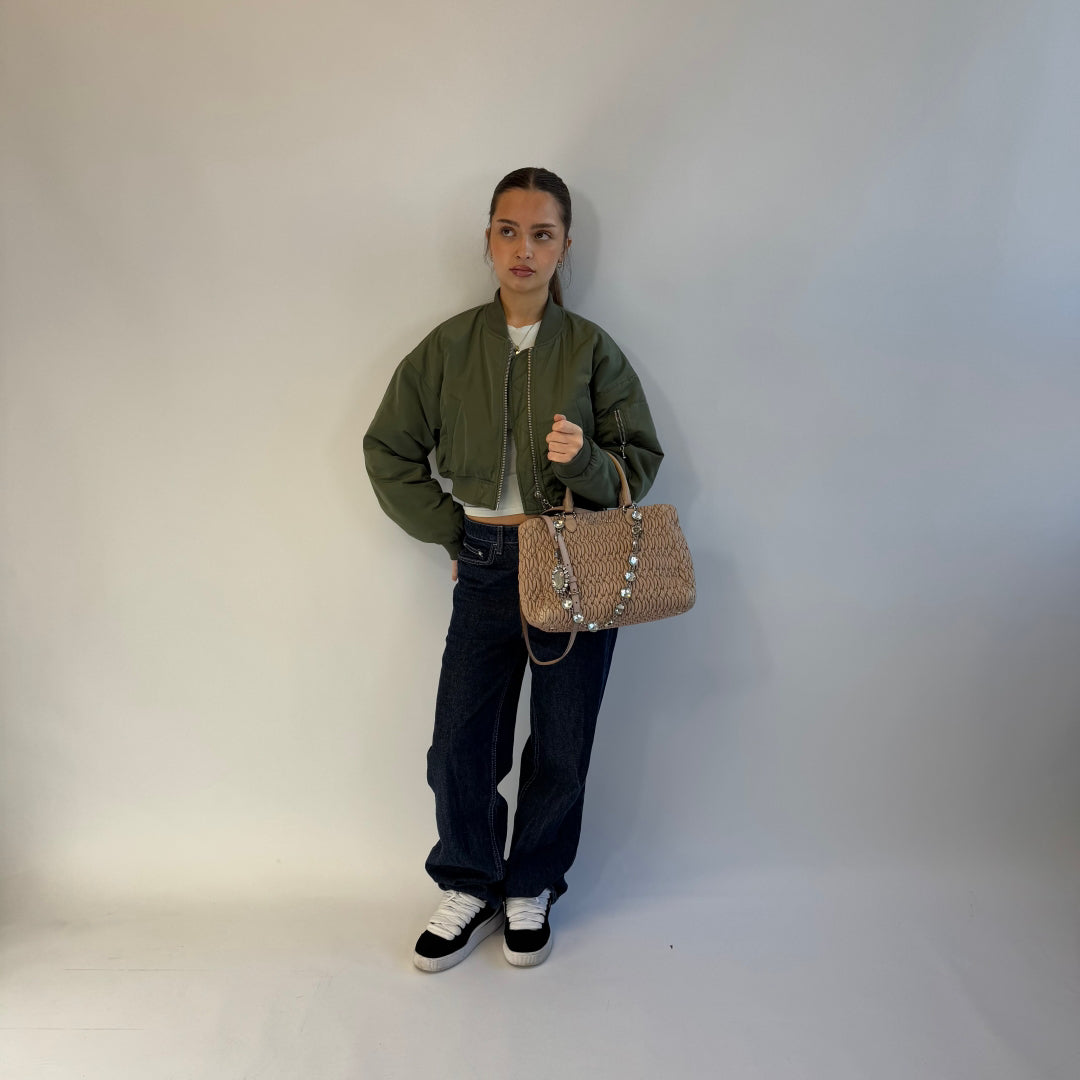 Miu Miu handbag Matelassé with shoulder strap and Miu Miu charm in pink leather